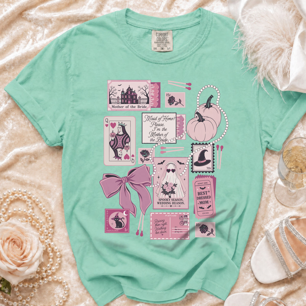 Mint t-shirt with "Mother of the Bride" Halloween-themed graphic.