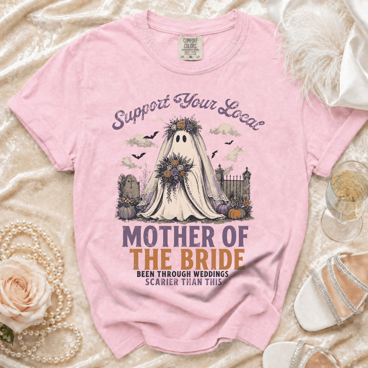 Pink t-shirt with "Mother of the Bride" and ghost graphic saying "Been through weddings scarier than this".
