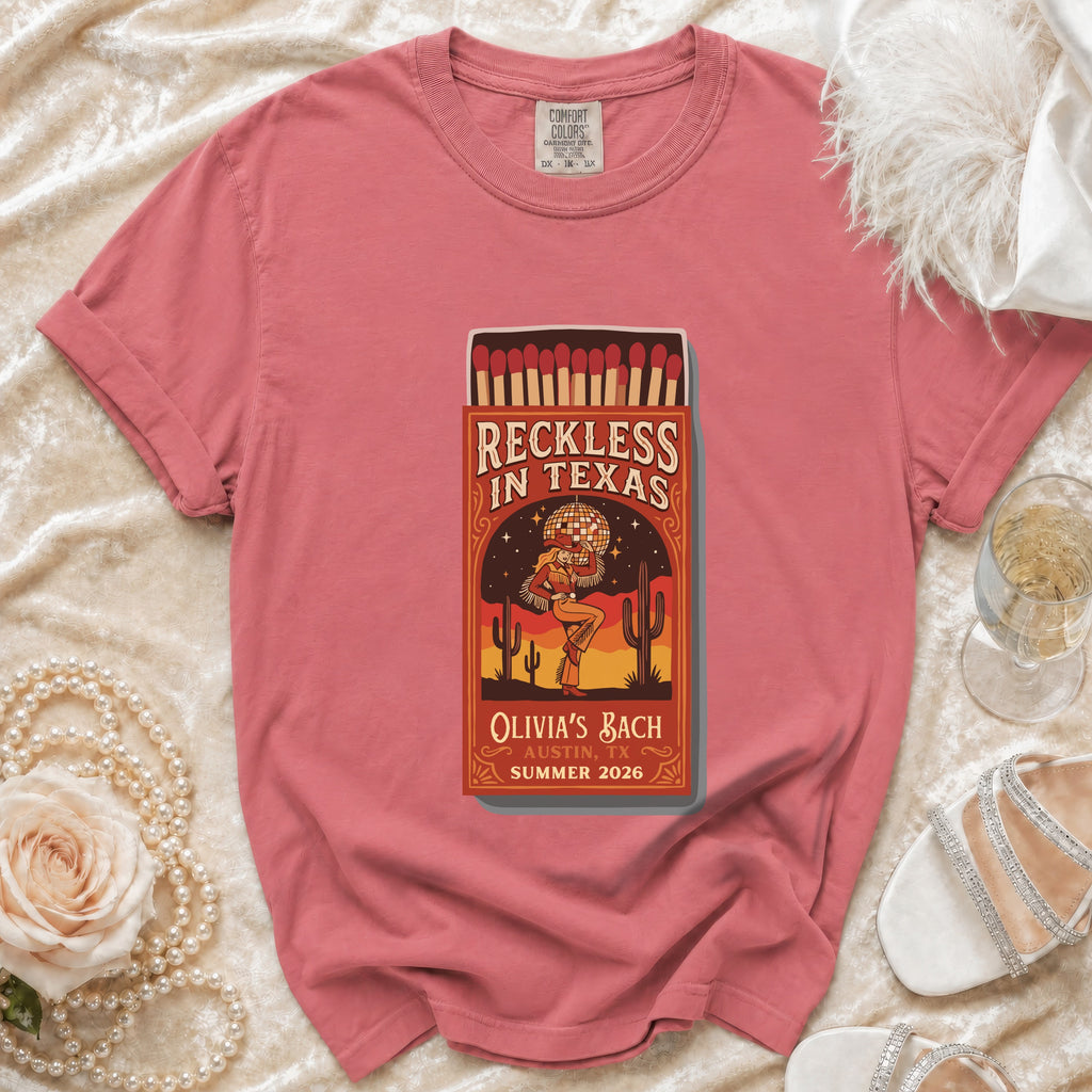 T-shirt with "Reckless in Texas Olivia's Bach Austin, TX Summer 2026" design.