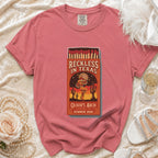 T-shirt with "Reckless in Texas Olivia's Bach Austin, TX Summer 2026" design.