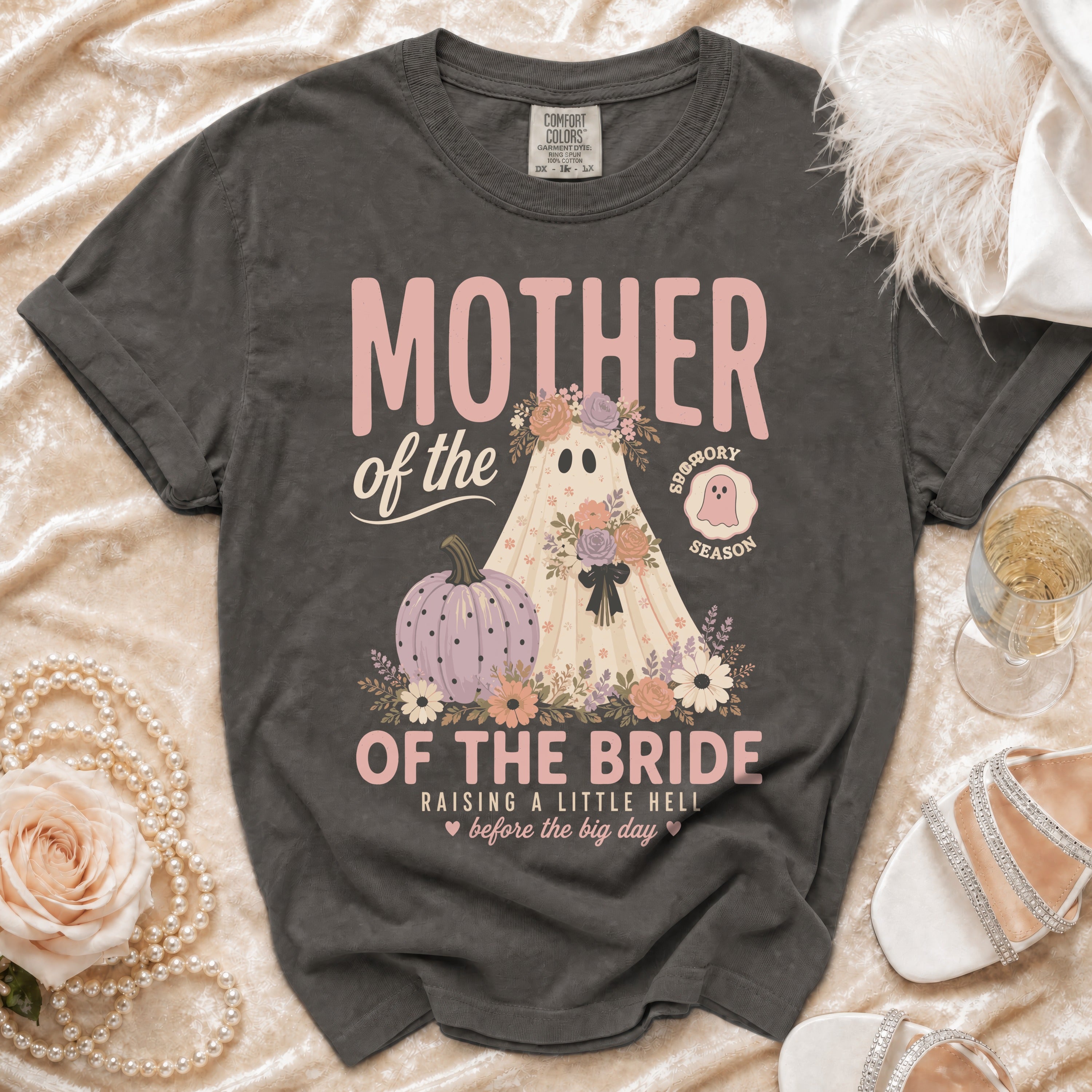 Mother of the Bride shirt with ghost, pumpkin, and floral Halloween-themed graphic.