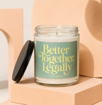 Glass candle with "Better Together, Legally" text on label, lid propped open.