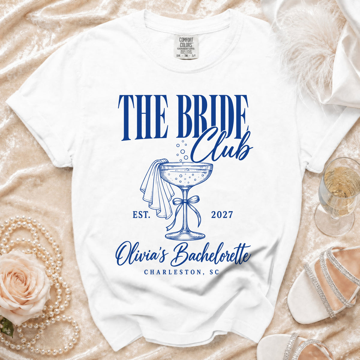 White t-shirt with "The Bride Club" and "Olivia's Bachelorette Charleston, SC" text.