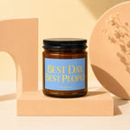 Amber candle with a blue label reading "BEST DAY, BEST PEOPLE VOWED".