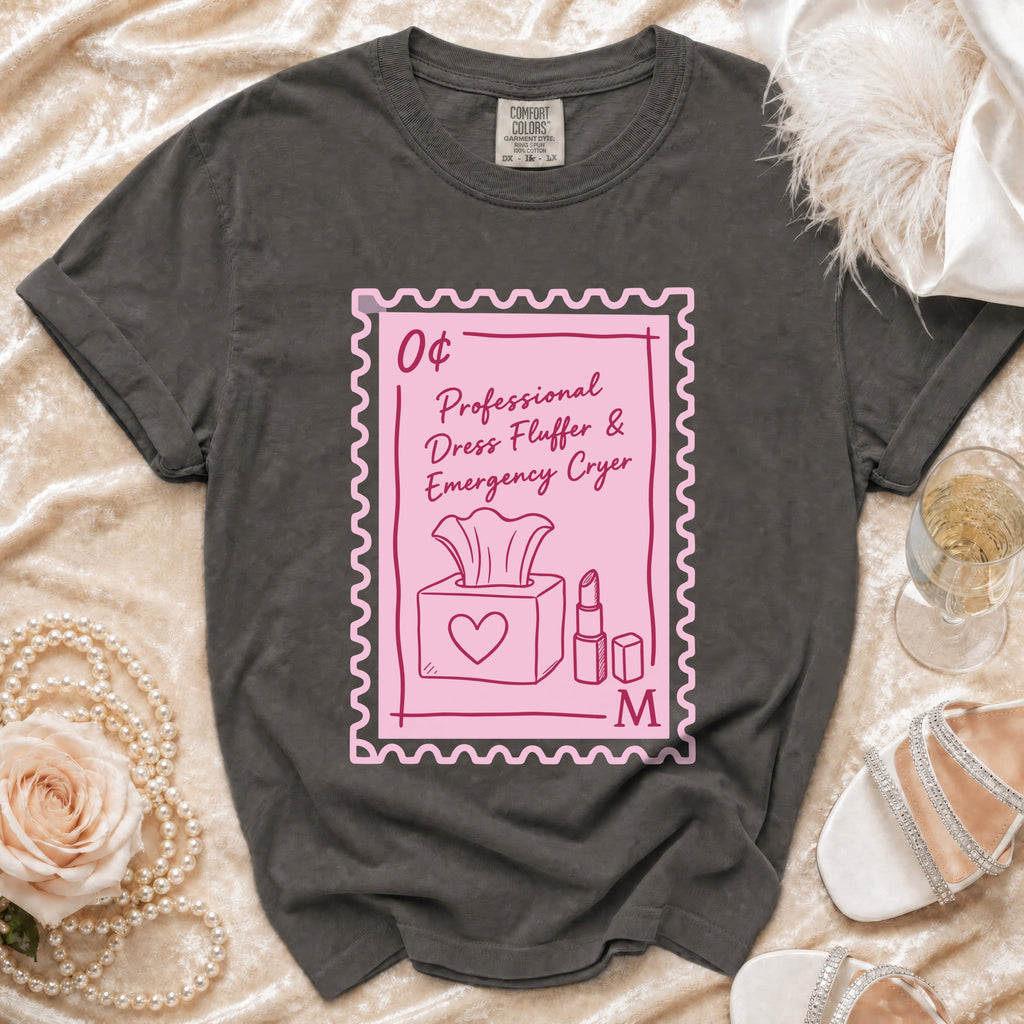 Dark grey t-shirt with "0¢ Professional Dress Fluffer & Emergency Cryer" design.