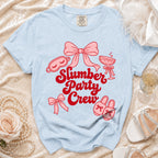 Light blue t-shirt with "Slumber Party Crew" text and slumber party icons.