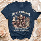 Dark blue t-shirt with "Mother of the Groom, I Raised the Groom, You Survive the Night" text.