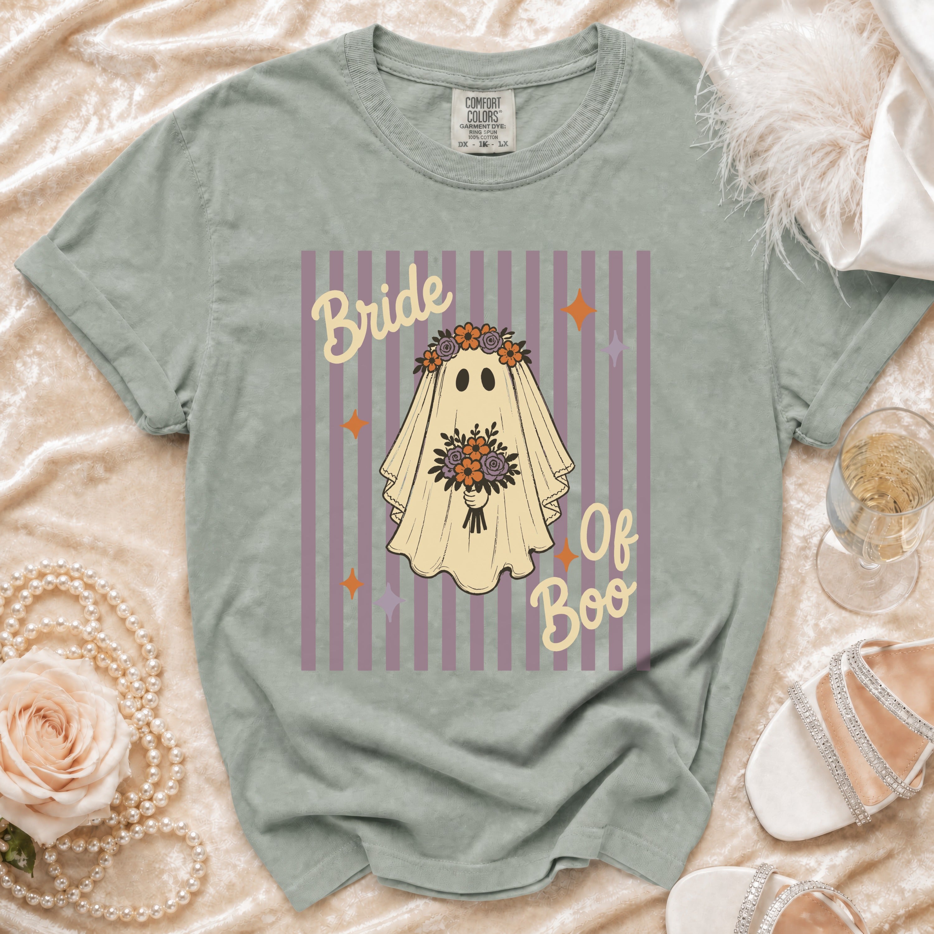T-shirt with ghost graphic reading "Bride Of Boo," flowers, and stars.