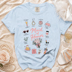 Light blue t-shirt with "Maid of Honor" design and wedding-themed illustrations.