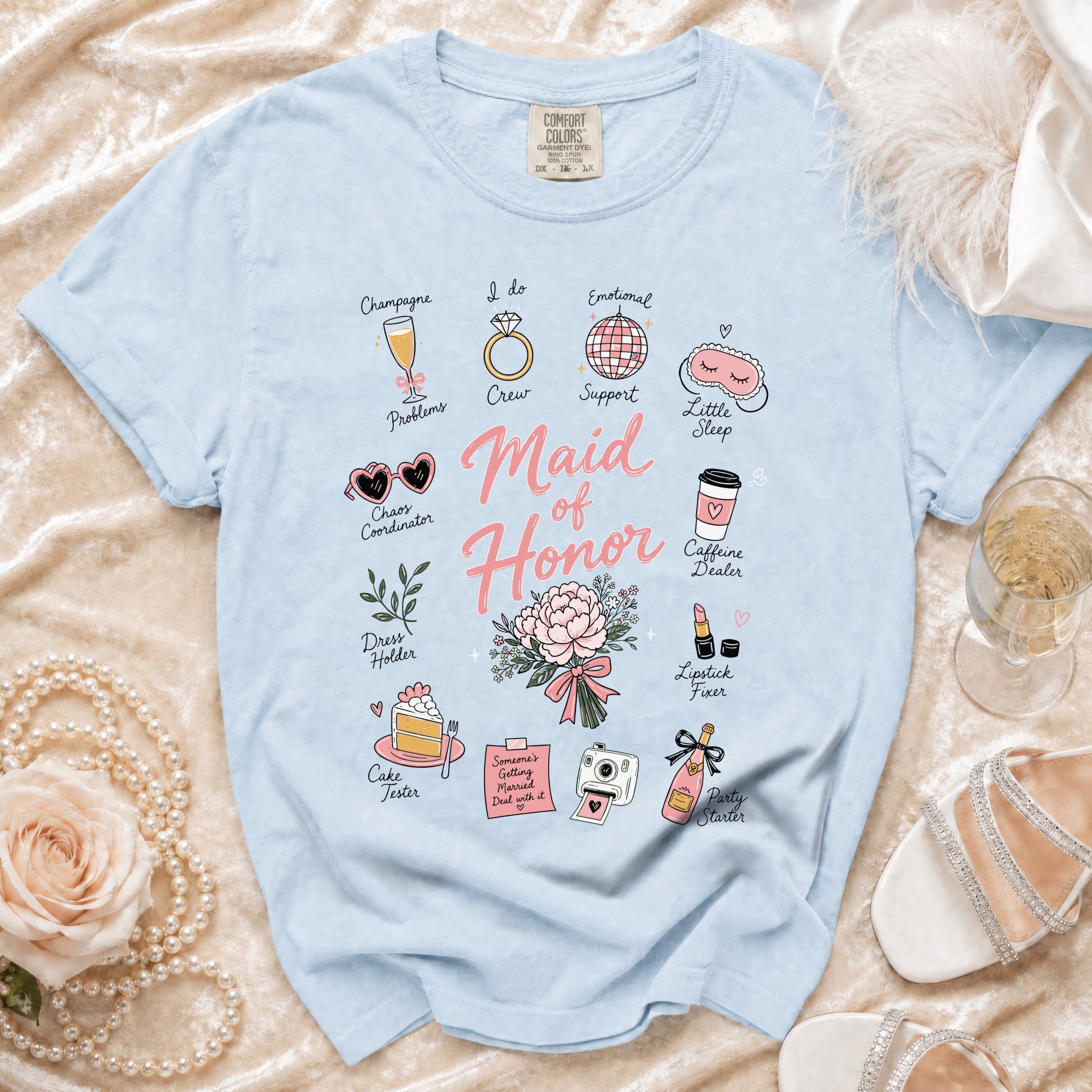 Light blue t-shirt with "Maid of Honor" design and wedding-themed illustrations.