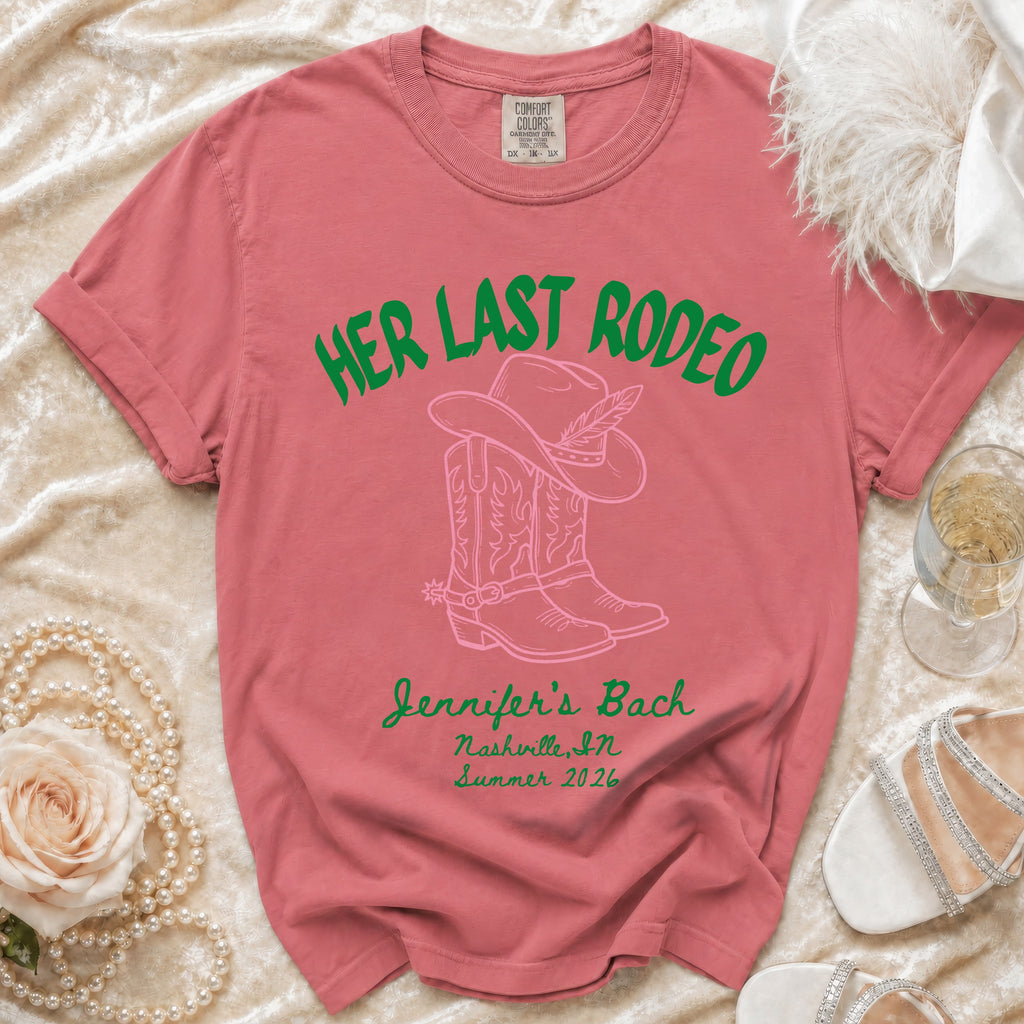 Pink t-shirt with "HER LAST RODEO" and cowboy boots graphic.