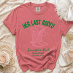 Pink t-shirt with "HER LAST RODEO" and cowboy boots graphic.