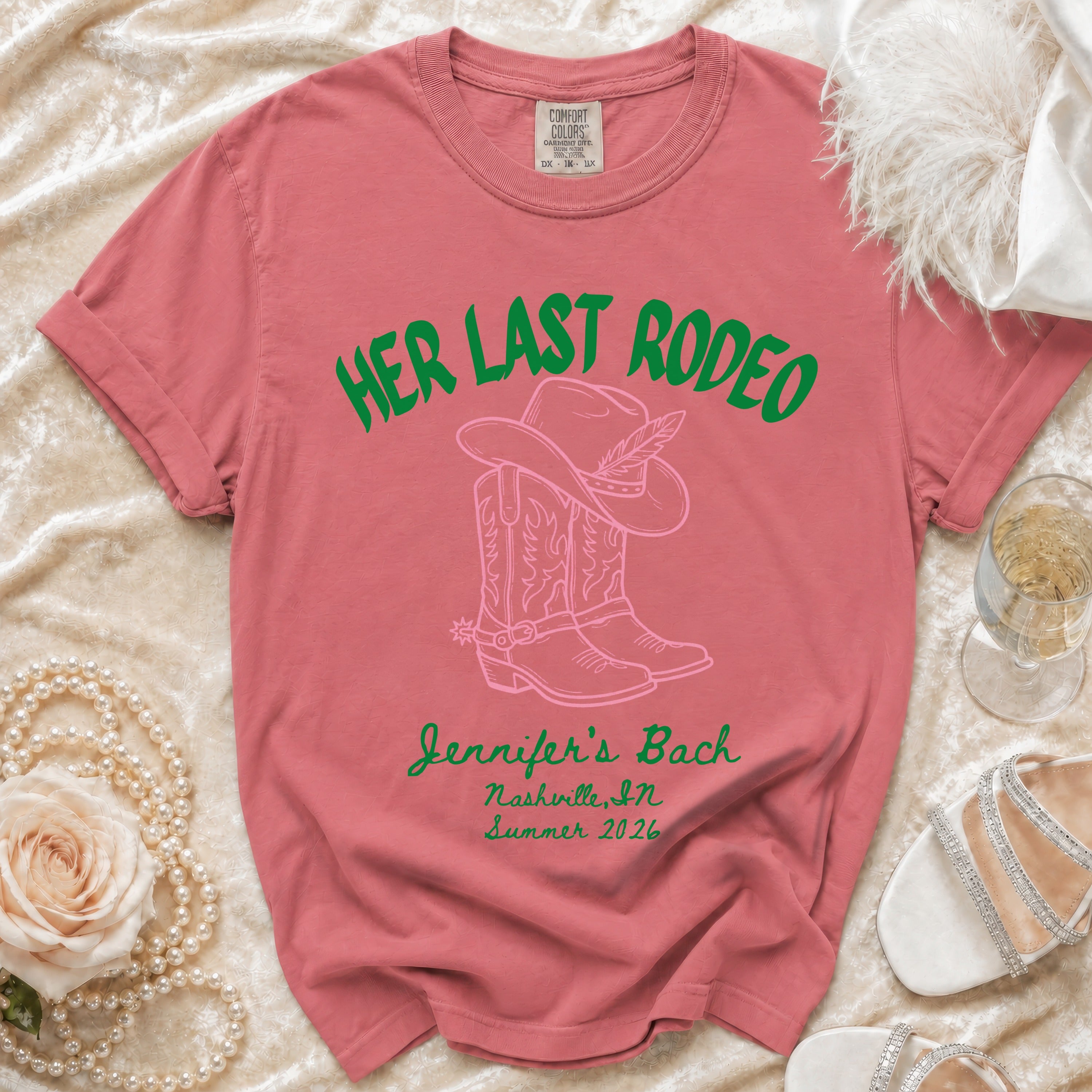Pink t-shirt with "HER LAST RODEO" and cowboy boots graphic.