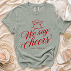 Light sage t-shirt with red text "We say Cheers The Crew".