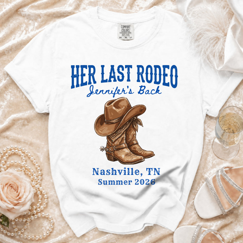 White t-shirt with "Her Last Rodeo" and cowboy boots graphic.