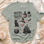 Green t-shirt with "Mother of the Bride (and still keeping it spooky)" graphic.