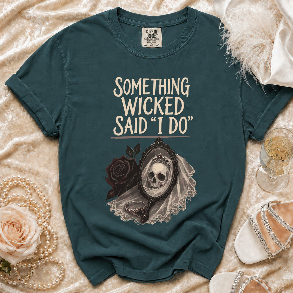 Teal t-shirt with "Something Wicked Said I Do" text and skull in a mirror.