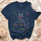 Navy t-shirt with "Mother of the Bride... but make it spooky" text and cross-stitch designs.