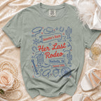 "Her Last Rodeo" bachelorette t-shirt with cowboy boots, sheriff badge, and cactus design.