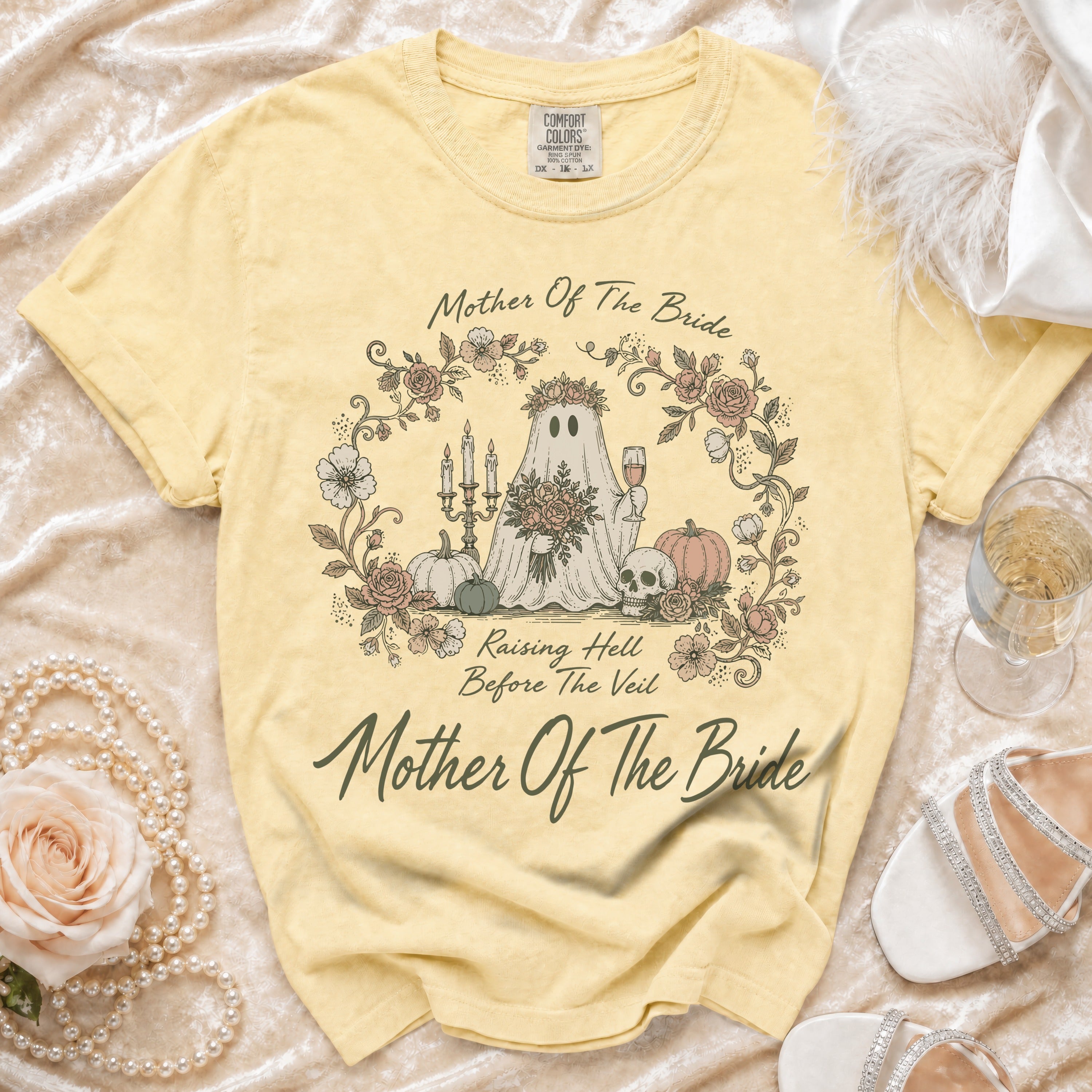 Yellow t-shirt with ghost, flowers, and "Mother Of The Bride" text.