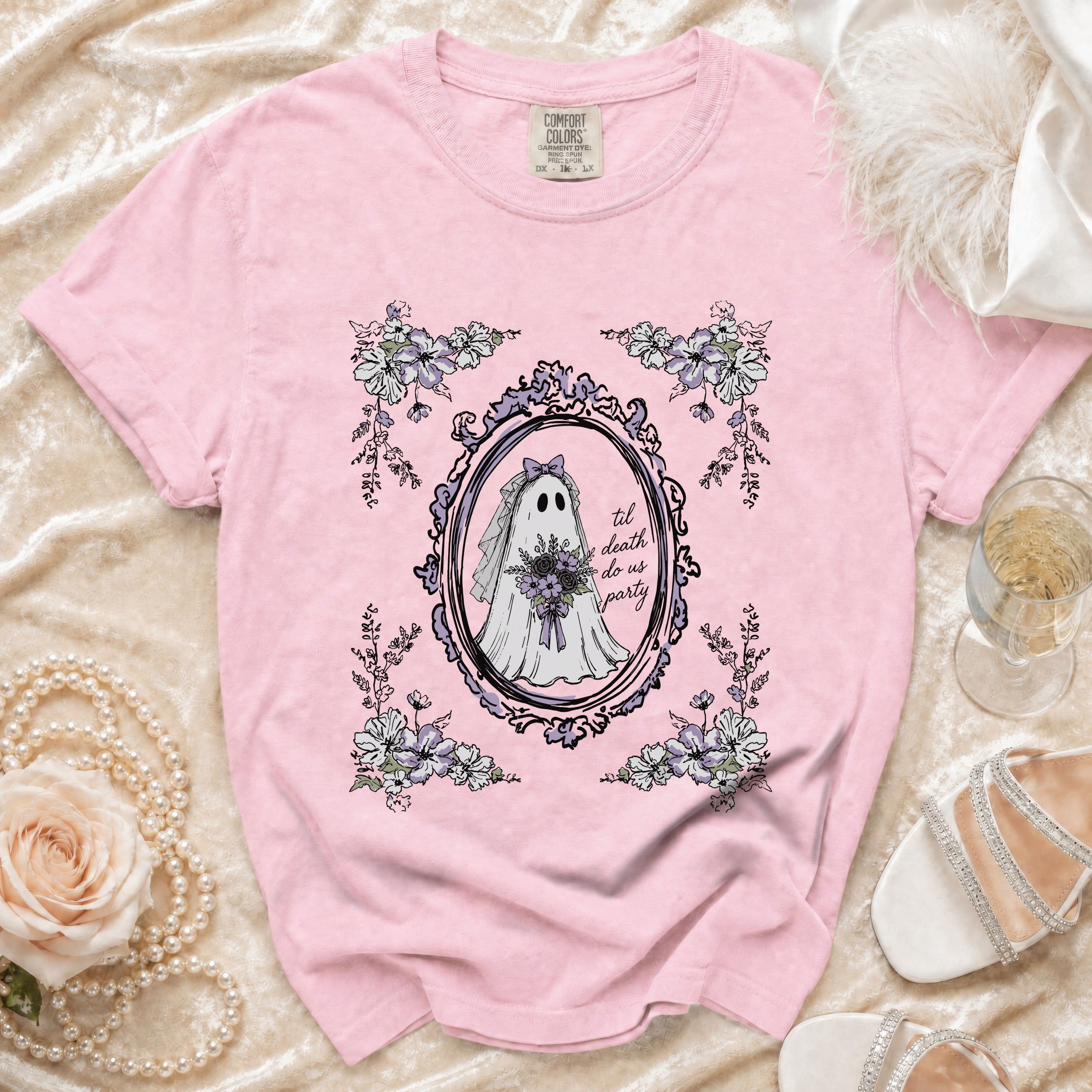 Pink t-shirt with ghost bride graphic and text "til death do us party".