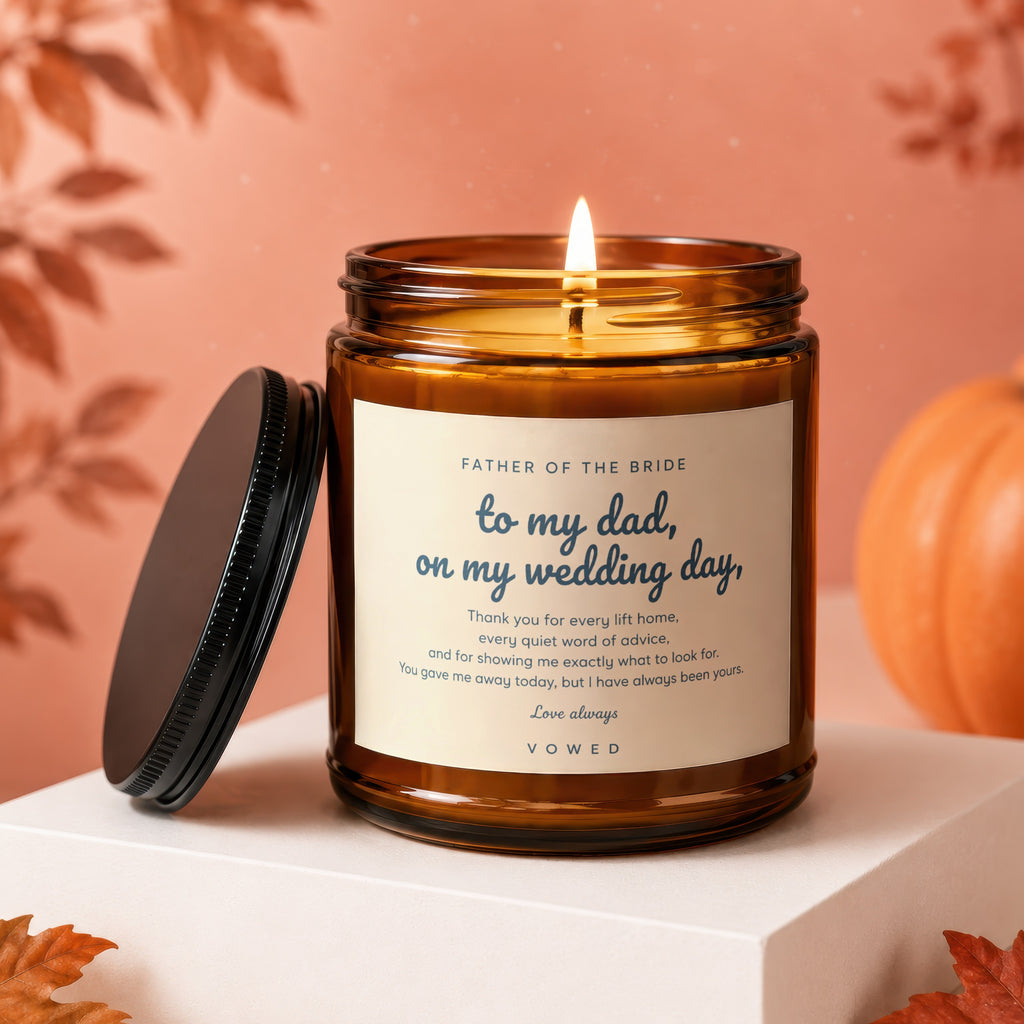 Amber jar candle with "To my dad, on my wedding day" message and autumn decor.