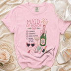 Pink t-shirt with "Maid of Honor" list including planner, therapist, and champagne.