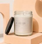Candle with "Happy Anniversary" label featuring date "11 03 09" and "Ruth + Caleb".