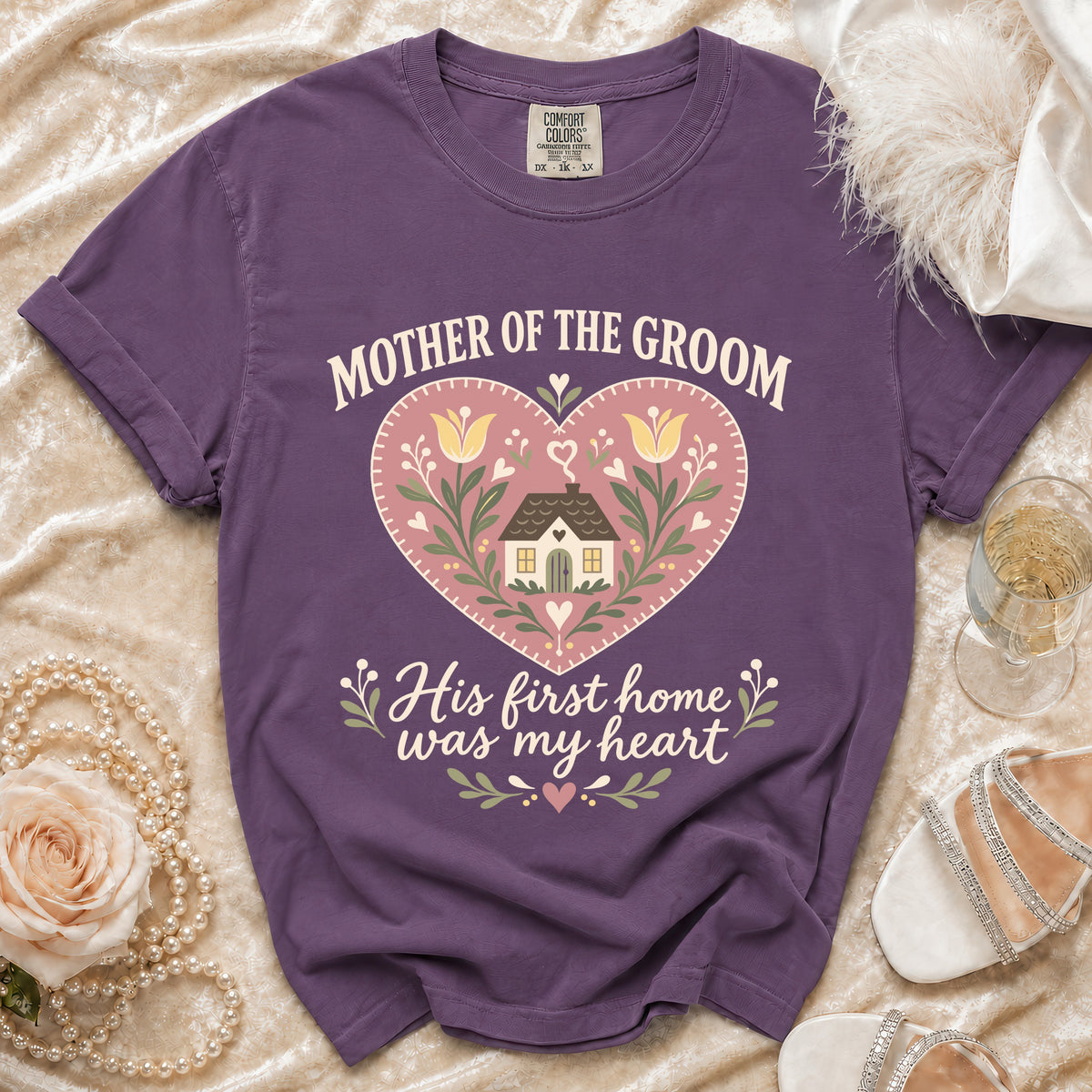 Purple t-shirt with "Mother of the Groom" and heart graphic.