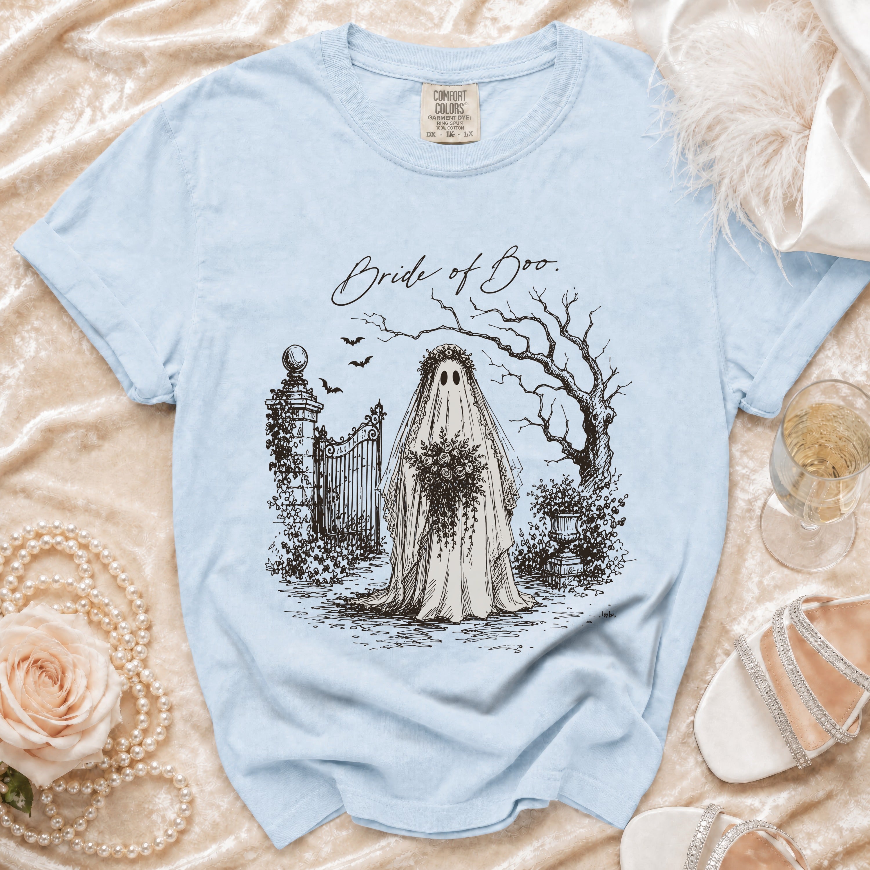 Light blue t-shirt with "Bride of Boo" graphic of a ghost bride and a gate.