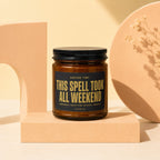 Brown jar candle with black lid and label reading "THIS SPELL TOOK ALL WEEKEND".