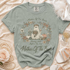 T-shirt with a "Mother Of The Bride" design featuring a ghost, flowers, and pumpkins.