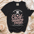 Black t-shirt with "Mother of the Bride Chief Wedding Planner" graphic.