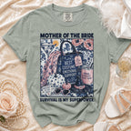 T-shirt with "Mother of the Bride" graphic and "Survival is my superpower." text.