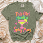 Green t-shirt with "This Girl Needs a Spicy Marg" graphic and margarita.