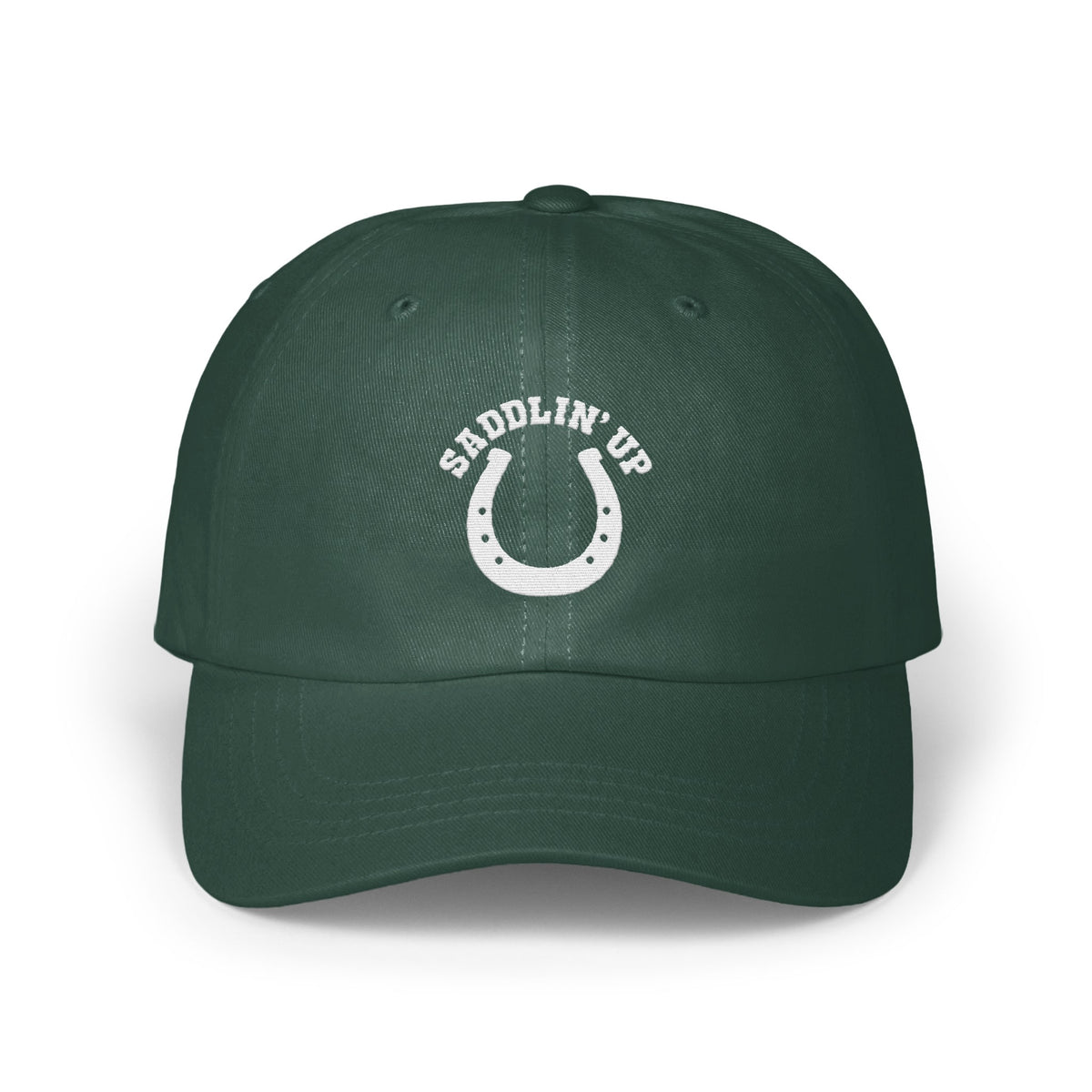 Dark green baseball cap with a white embroidered horseshoe and the text SADDLIN' UP.