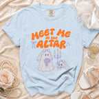 Light blue t-shirt with orange text "MEET ME at the ALTAR" and ghost bride illustration.
