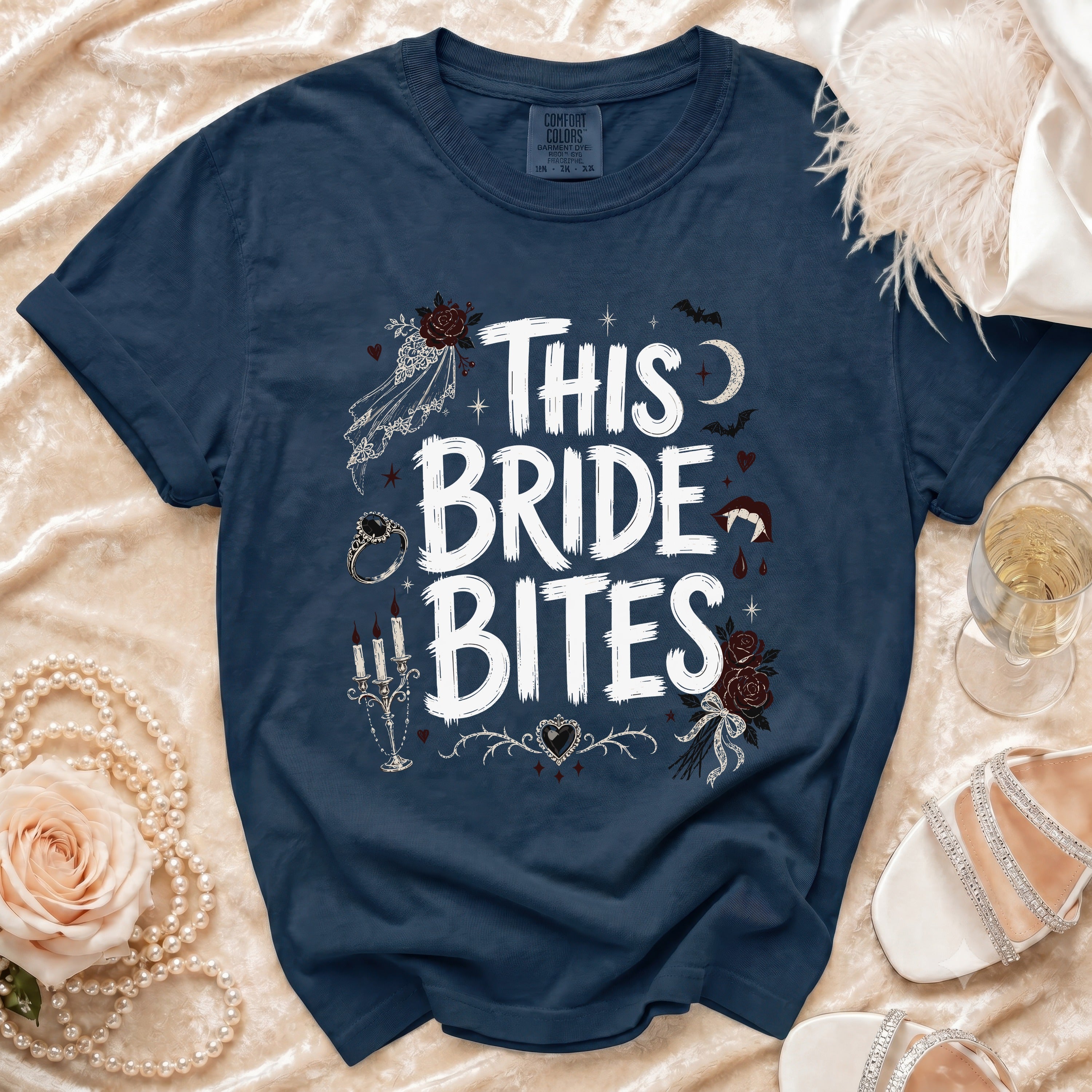Navy t-shirt with "This Bride Bites" text and gothic wedding graphics.