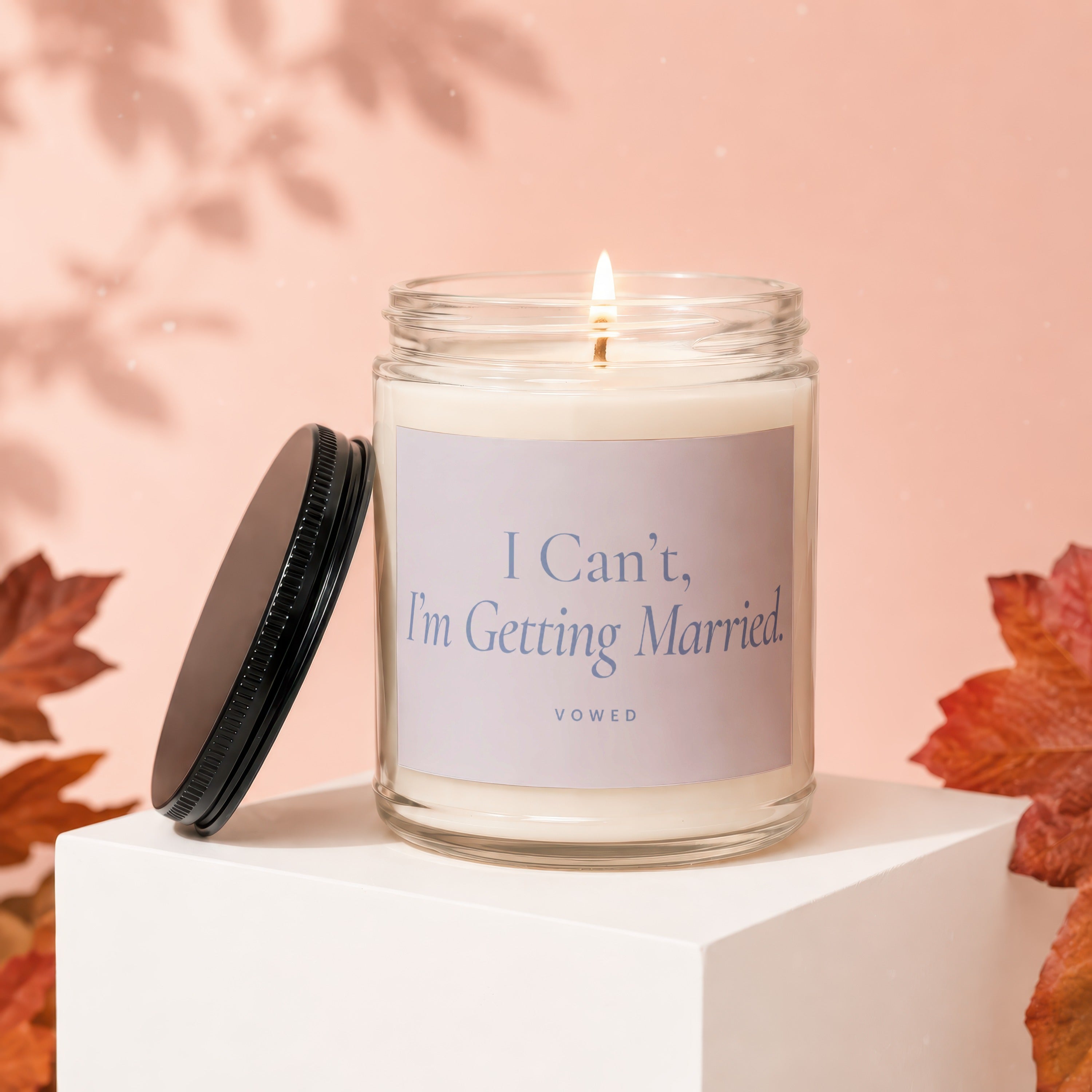 Glass candle with "I Can't, I'm Getting Married." text and "vowed" logo.
