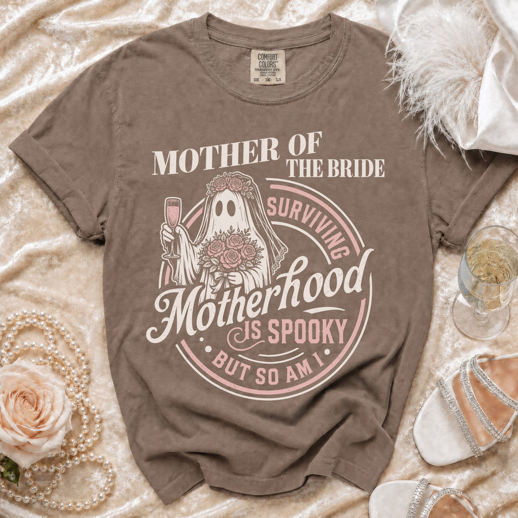Brown t-shirt with "Mother of the Bride" ghost graphic saying "Motherhood is Spooky but so am I."