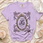 Purple t-shirt with cowboy boot, floral frame, and "Her Last Rodeo" text.