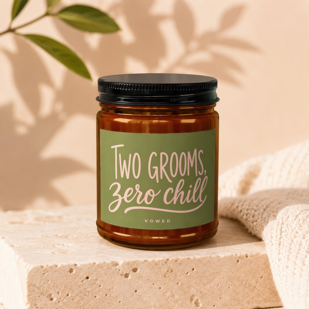 Amber candle with green label reading, "Two Grooms, Zero Chill"