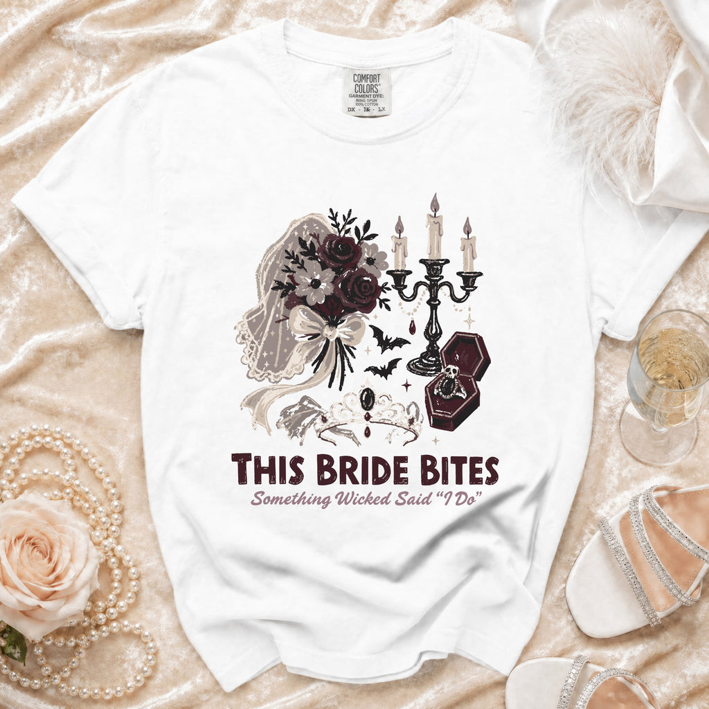 White t-shirt with "This Bride Bites" and gothic wedding graphics.