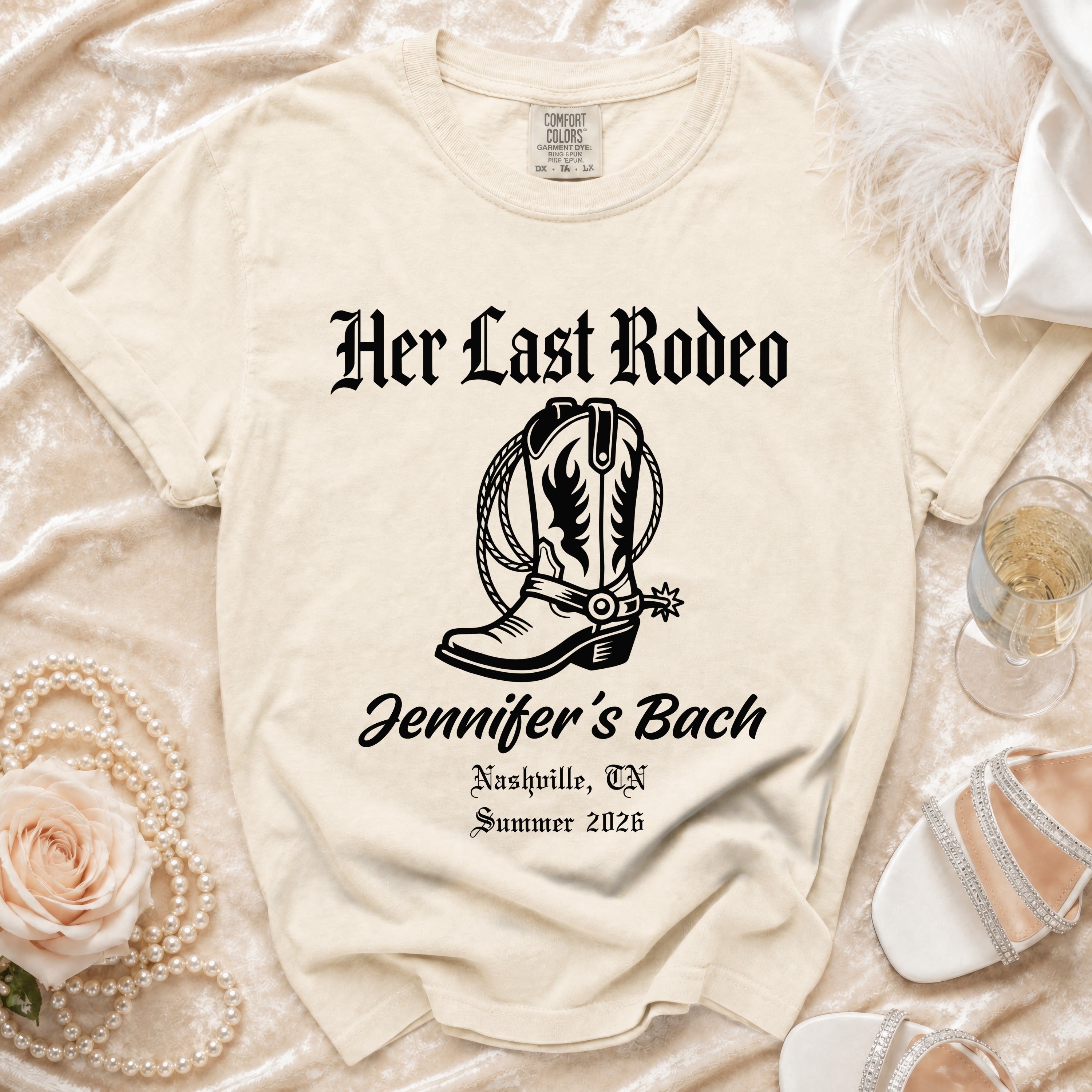 Cream t-shirt with "Her Last Rodeo" and cowboy boot graphic for Jennifer's Bach.
