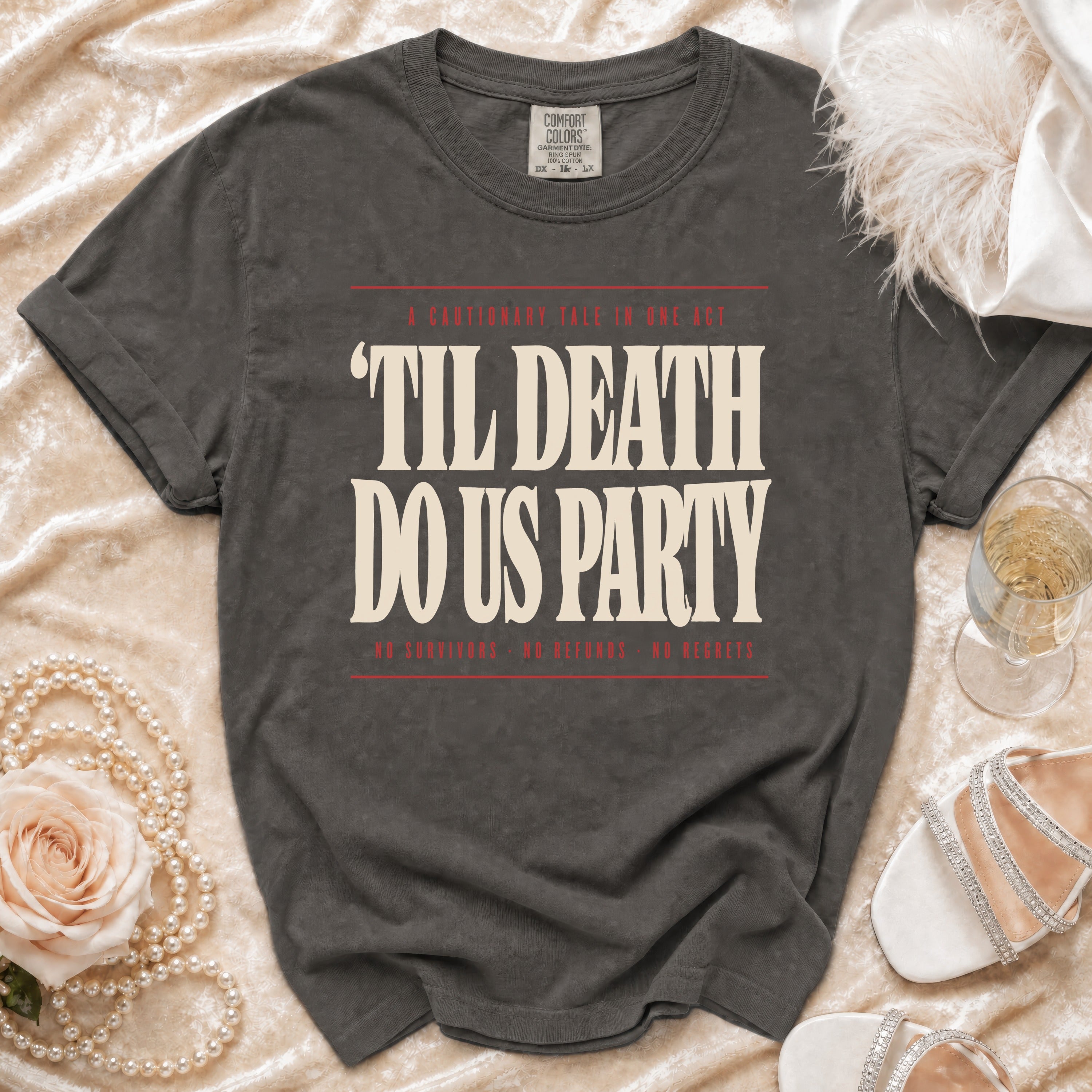 Dark gray t-shirt with "Til Death Do Us Party" text and small print.