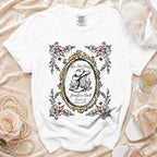 White t-shirt with "Her Last Rodeo" and bachelorette details in an oval frame.