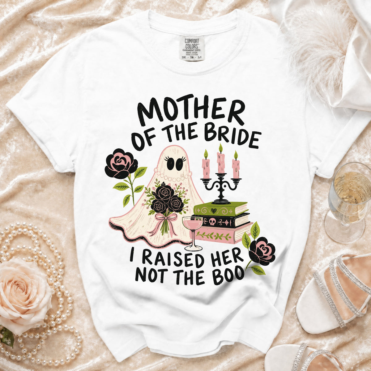 White t-shirt with "Mother of the Bride I Raised Her Not the Boo" graphic.