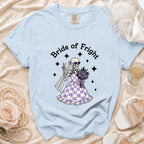 Light blue Comfort Colors t-shirt with "Bride of Fright" and skeleton bride graphic.