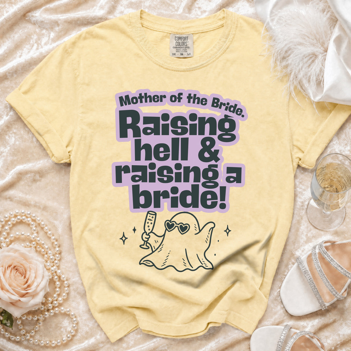 Yellow t-shirt with "Mother of the Bride. Raising hell & raising a bride!" text and ghost graphic.