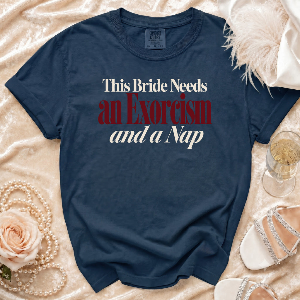 Navy t-shirt with "This Bride Needs an Exorcism and a Nap" text.